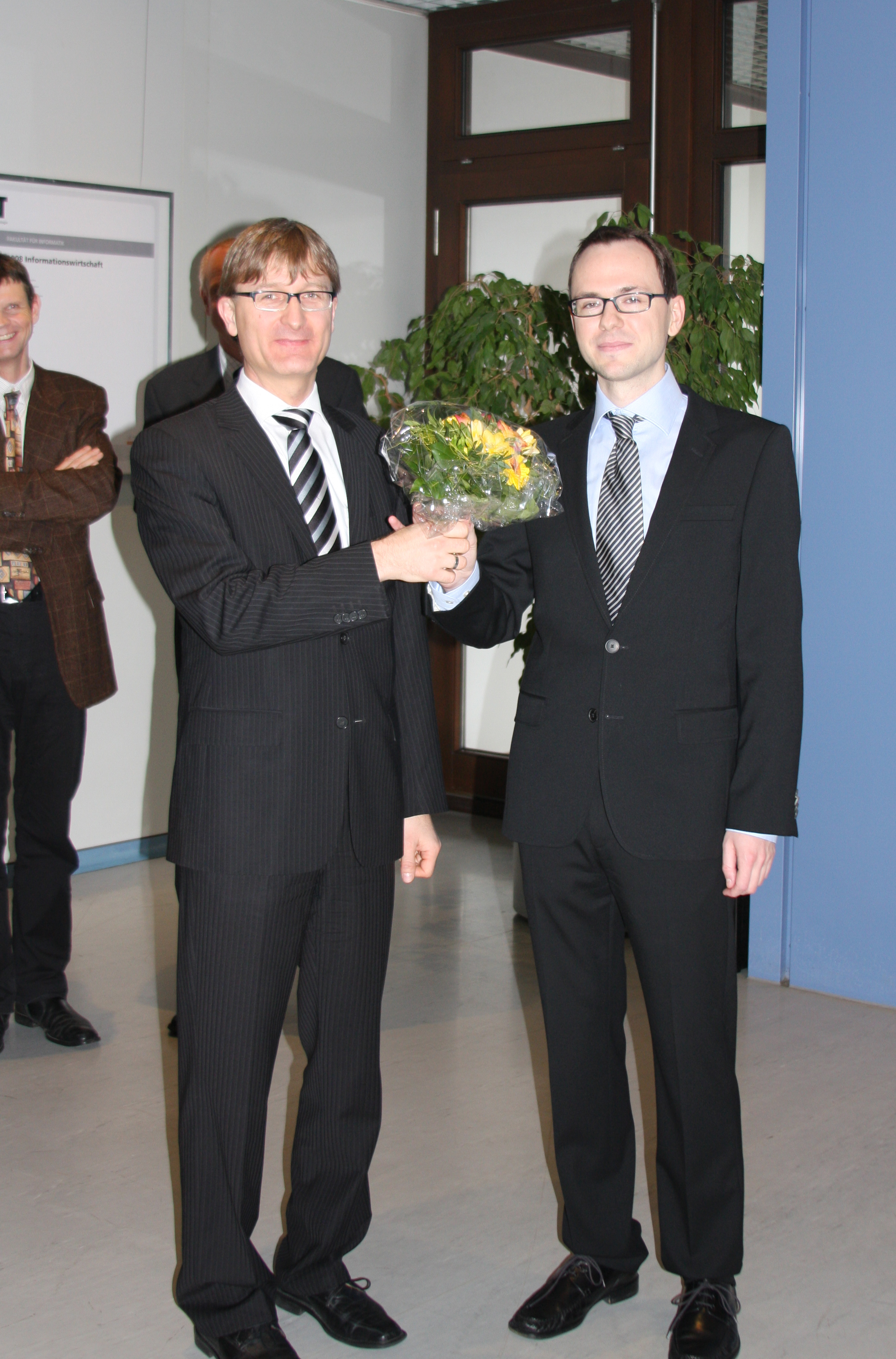 Prof. Beigl gratuliert Frank Otto